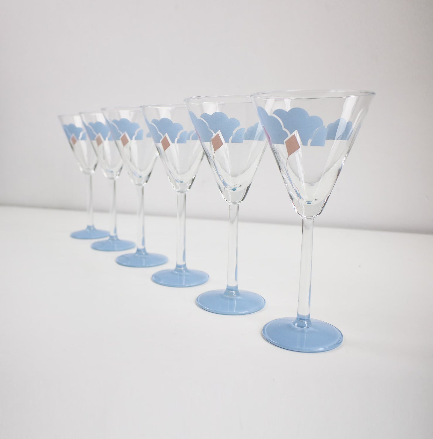 RESERVED RC - mid century glass top coffee table, jens quistgard tray, 1980s cocktail glasses