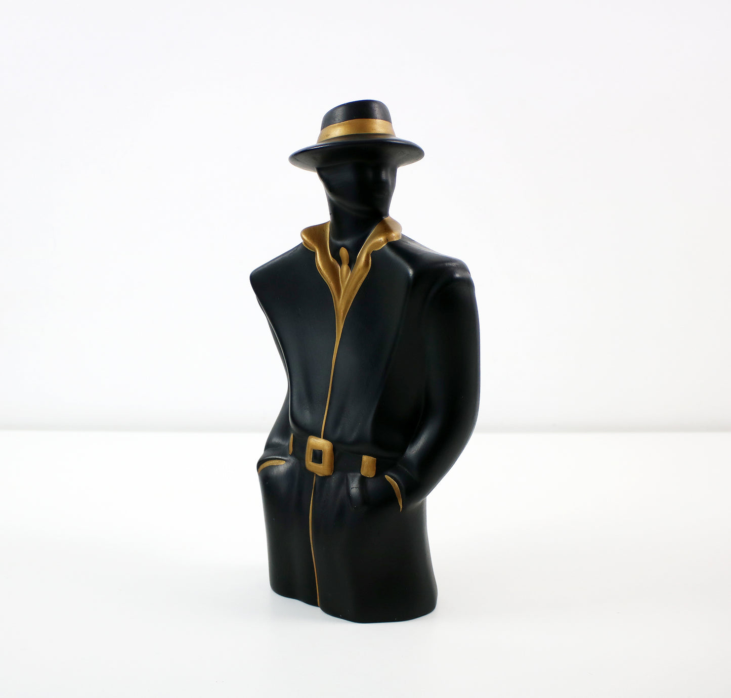 Male figurine with hat in black and gold 1980s post modern art deco revival
