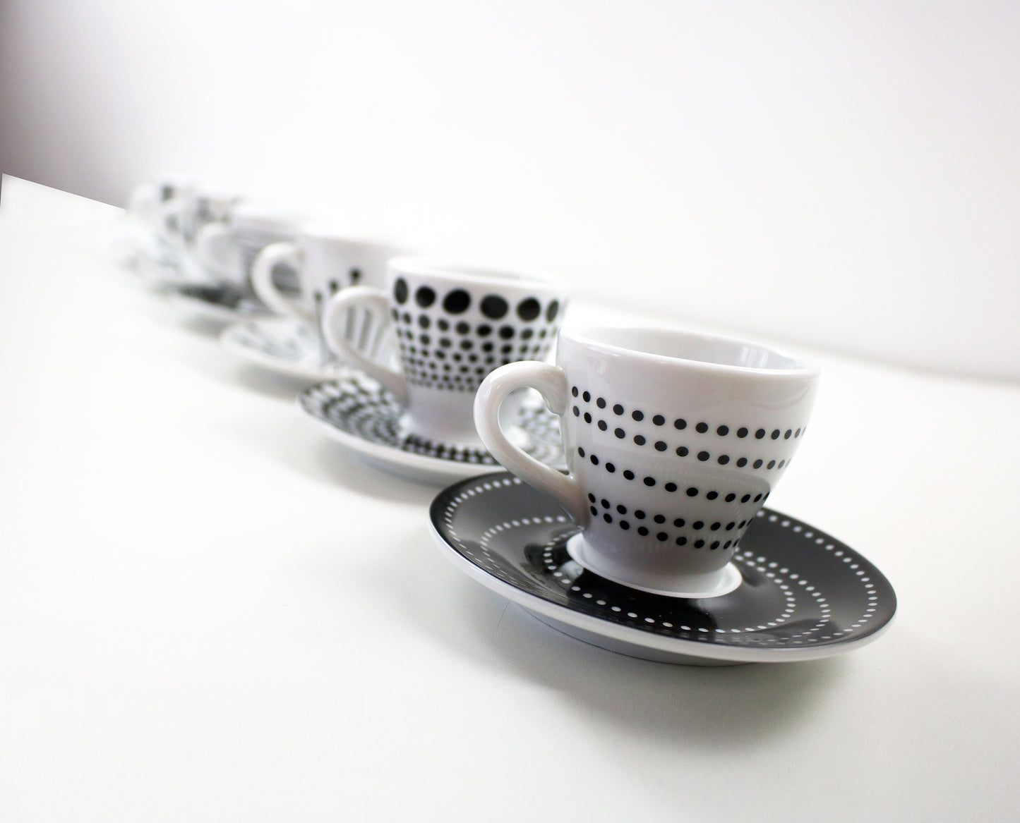 Paula by Bodum Denmark - black and white espresso cup and saucer set