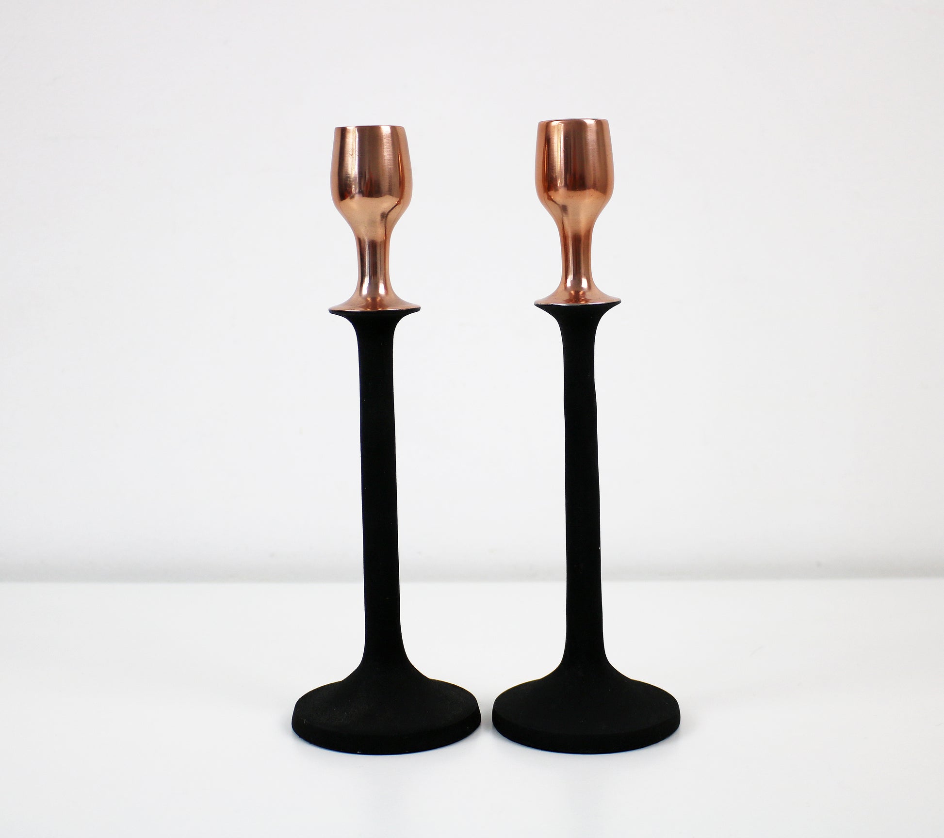 Copper and black John Lewis Scandi style candlestick pair