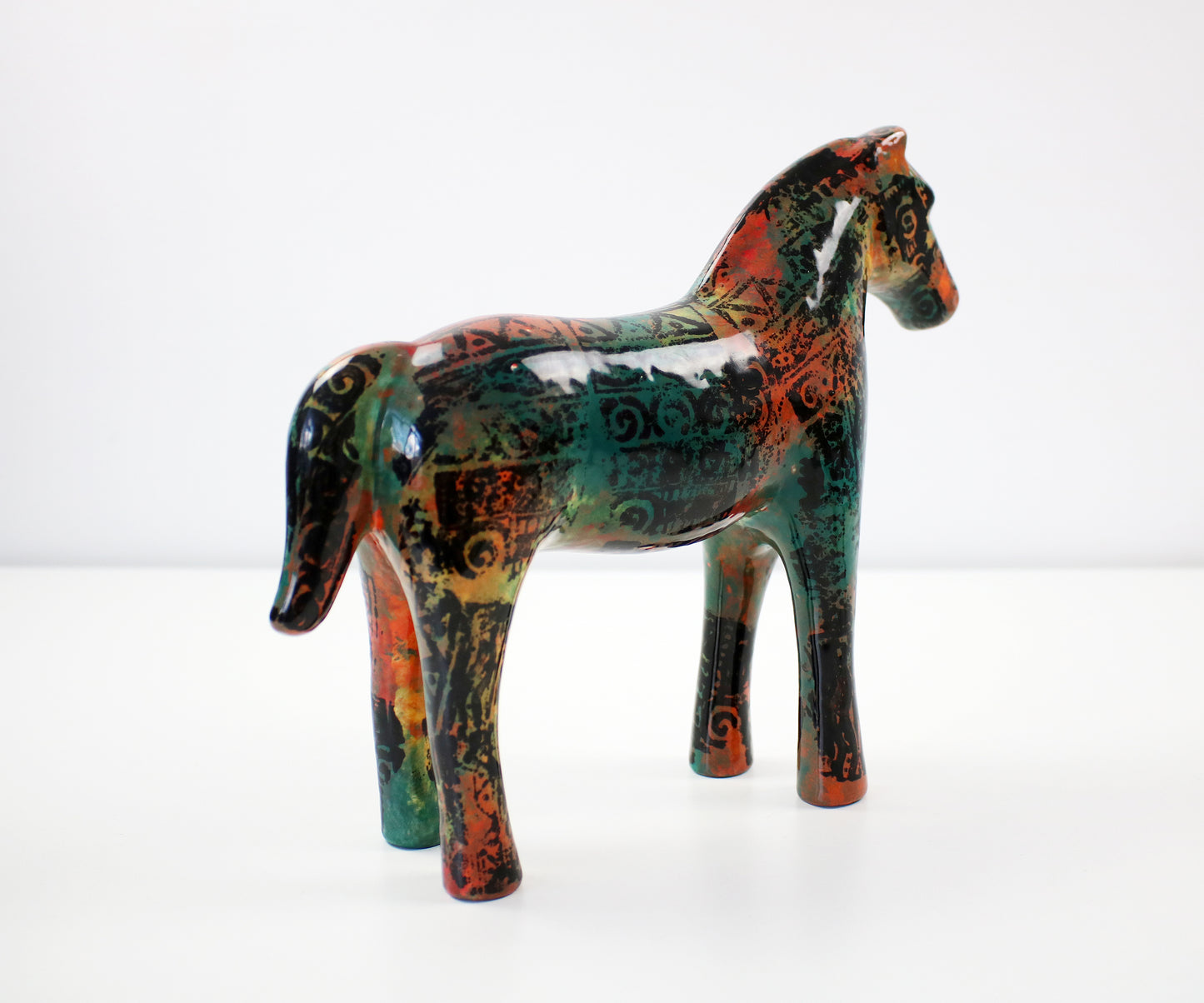 Aztec pattern glazed ceramic horses - hand decorated and signed JM Mayco 2006