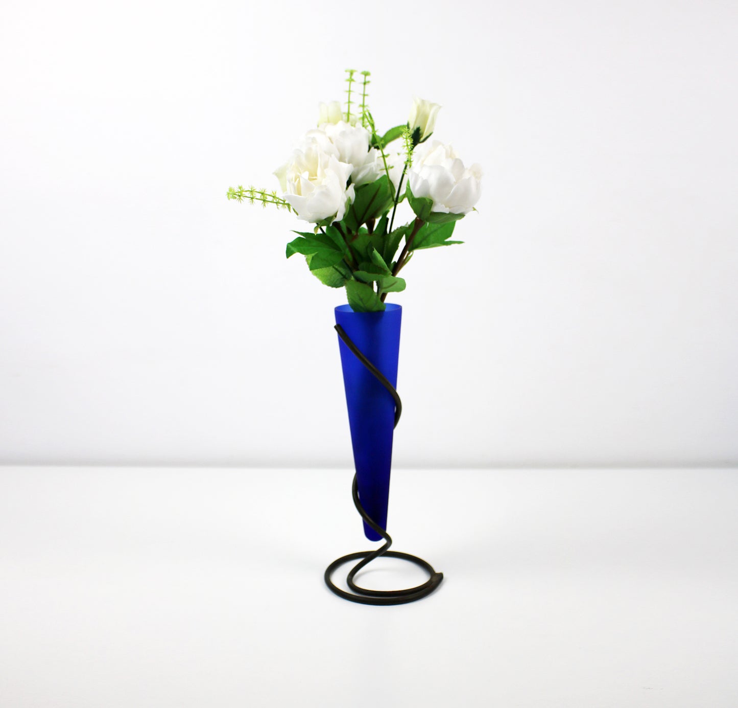 Deep blue glass cone vase in metal spiral holder - 24cm