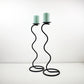 Pair of post modern floor standing wave squiggle iron candlesticks