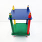 Postmodern wooden pencil shelf unit - 2 tier small - bedside / lamp table